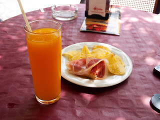appetizer with juice and ham