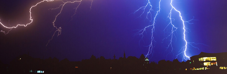 Thunder, lightnings and rain on stormy summer night