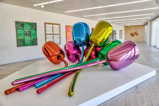 Milan, July 4, 2022: "Tulips" artwork by Jeff Koons in Milan's Prada Foundazione "Atlas" installation exhibit in the 6 levels of the Torre featuring paintings and sculptures of  a variety of artists