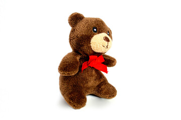 Lovely brown bear doll isolated on white background. Adorable teddy bear for decorative. High quality photo