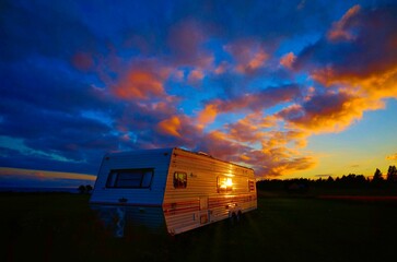 camping trailer at sunset