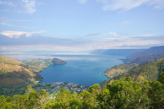 Lake Toba (Indonesian: Danau Toba)  is a large natural lake in North Sumatra, Indonesia, occupying the caldera of a supervolcano.