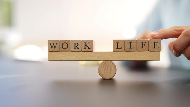 Balance Between Life And Work On Seesaw