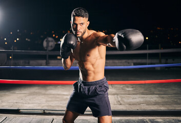 Boxing ring, exercise and man or boxer in gym training for fitness, fight or workout. Sport,...