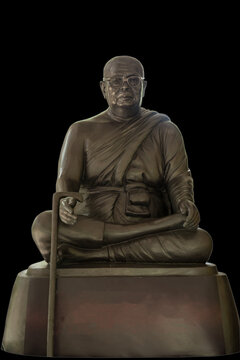Statue of buddhadasa bhikkhu black background