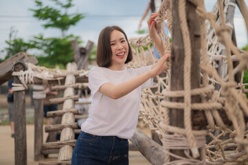 Beauty Asian women white t shirts on playground school Activity