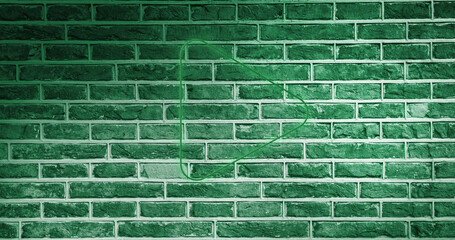Image of glowing neon arrow icon on brick wall