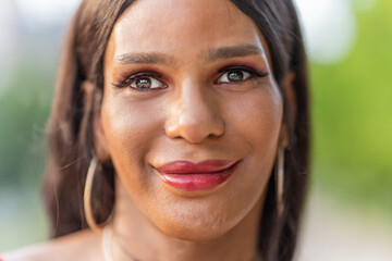 Portrait of a Transgender woman smiling at the camera