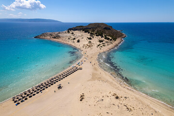 Fototapeta na wymiar Aerial view of Simos beach in Elafonisos. Located in south Peloponnese elafonisos is a small island very famous for the paradise sandy beaches and the turquoise waters.