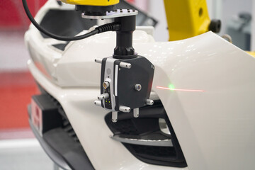 T-SCAN 3D scanner with Robotic arm in automotive industry. Industrial and technology for industry 4.0. Robotic for automotive factory with T-SCAN 3D scanner technology.