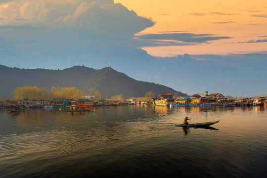 Sunset at Dal Lake, City of water at Kashmir. Lifestyle of people transportation around Dal Lake city in the evening.