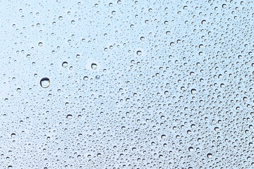 drops glass blue background abstract, transparent cold background water splashes