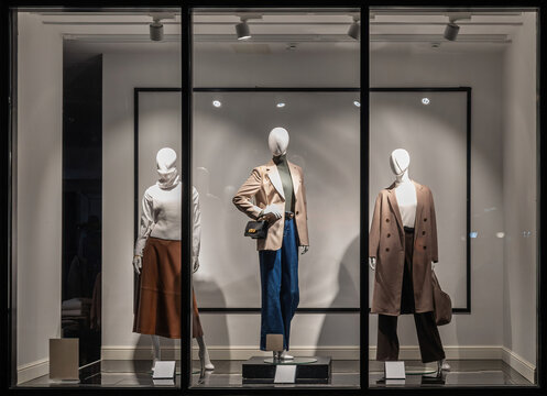 Women's Clothing Store Mannequins Dressed Stylish Clothes Shop Window Red  Stock Photo by ©fototota 365349674