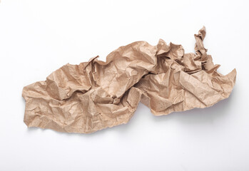 Crumpled craft paper on a white background. Eco concept.