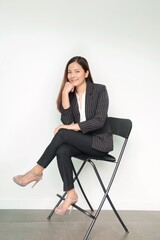 business woman sitting on chair