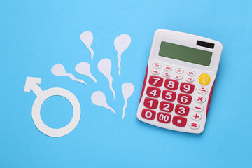Spermatozoa and male gender symbol with calculator on a blue background. Man's health