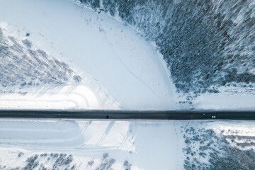 turn of the river ice and snow on the river, bridge over the river aerial view