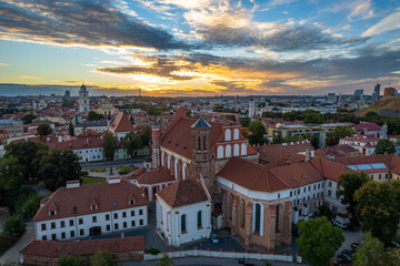 Fototapeta na wymiar Aerial autumn beautiful sunset view of Church of St. Anne, Vilnius old town, Lithuania