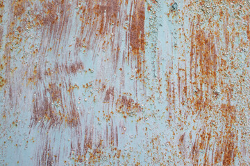 Rusty metal texture background. Old grunge corrosion surface. Light blue metal texture with scratches and cracks