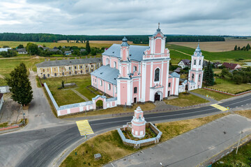 Fototapeta na wymiar aerial view on baroque temple or catholic church in countryside