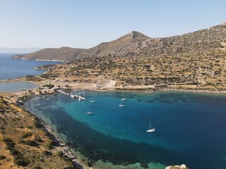 Aerial view of a sailing boat in the bay