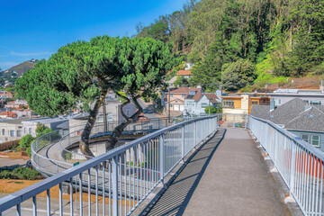Raised winding footpath overlooking houses in San Francisco California