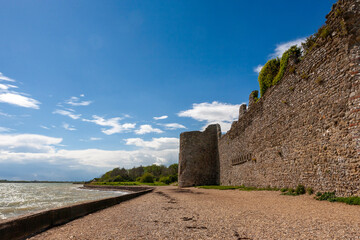 The 3rd century Roman fortress walls at Portchester, Hampshire, UK, on the shores of Portsmouth...