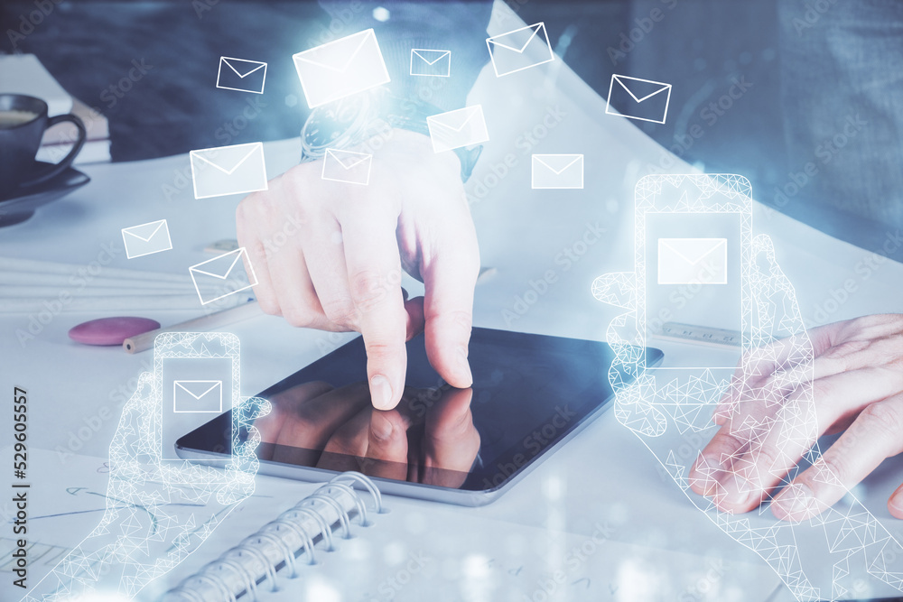 Poster Double exposure of man's hands holding and using a digital device and envelop hologram drawing. E-mail concept.