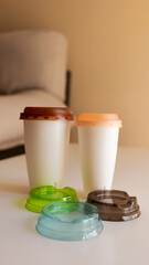 plastic cups of coffee in the living room