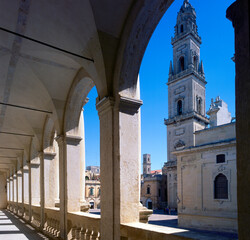 Lecce. Piazza del Duomo con Colonnato del Palazzo dell' Episcopio verso la Piazza e il Campanile