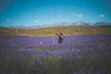 Upside down person frolicking in lavender field