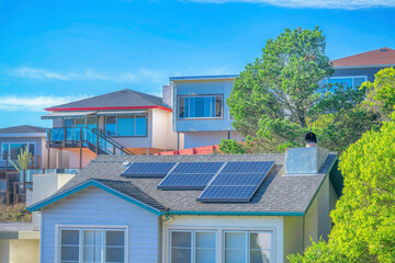 House with solar panels on roof at a neighborhood in San Francisco California
