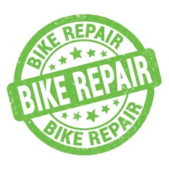 BIKE REPAIR text written on green round stamp sign.