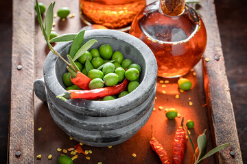 Fresh and healthy oil with hot chilli peppers.