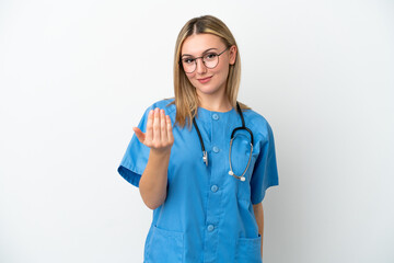 Young surgeon doctor woman isolated on white background inviting to come with hand. Happy that you came