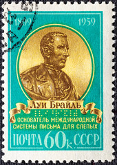 USSR - CIRCA 1959: A stamp printed in USSR shows portrait of Louis Braille 1809-1852 , 150th anniversary of the birth of Louis Braille, French educator of the blind.