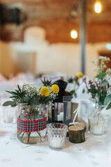 Elegant table setting and decoration for a dinner at a wedding location