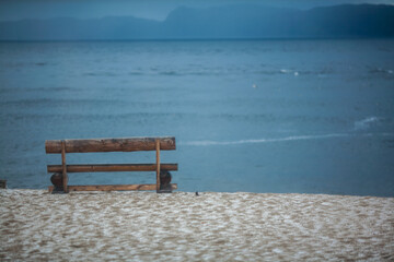 Wooden bench on the beach