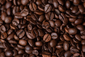 Roasted coffee beans background. Macro photo