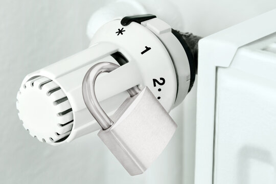 White heater and thermostat with lock close up