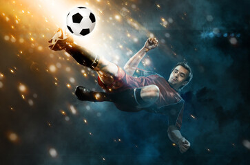 Football player. Soccer player. Man in football sportswear at the game in action with ball. Sport...