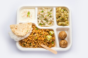Indian Upwas thali, fasting food platter or thali for home delivery or takeaway parcel for any Vrat
