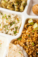 Indian Upwas thali, fasting food platter or thali for home delivery or takeaway parcel for any Vrat