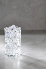 Glass of mineral water with ice