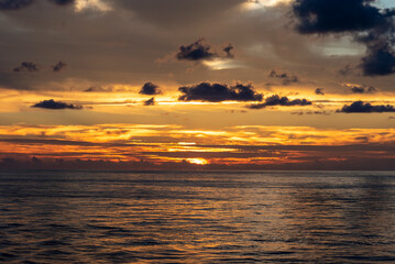 Sunset sky over the calm ocean. 