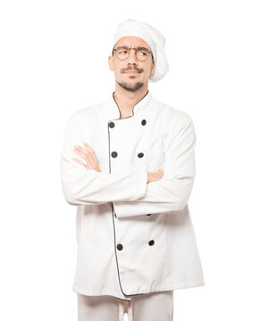 Hesitant young chef looking gesture