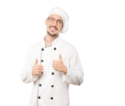 Happy young chef gesturing that everything is fine