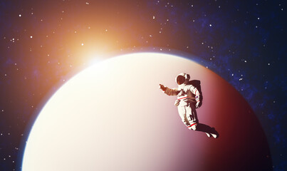 Astronaut spacewalk in space near a planet and pointing his finger.