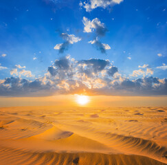 sandy desert with dune at the sunset