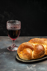 Homemade braided challah shabbat wine, Traditional Jewish Shabbat ritual. Shabbat or Shabath concept. vertical image. top view. place for text